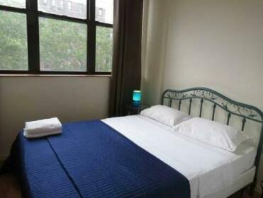 Heart of East Village Suites